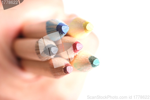 Image of colored pencils in a hand
