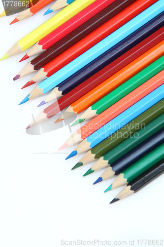 Image of Color pencils arrange on white background