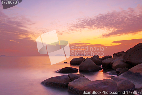 Image of Sunset over the ocean. Nature composition under long exposure.