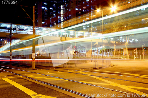 Image of Light rail at night in Hong Kong, it is a kind of transportation