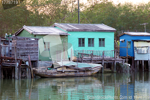 Image of Wooden houses along the river