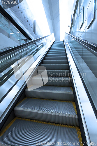 Image of Moving escalator to heaven concept