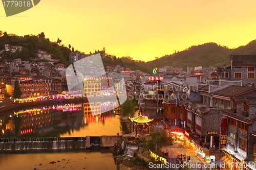 Image of Fenghuang ancient town in Hunan Province at sunset time