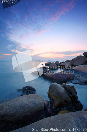 Image of Sunset under long exposure along coast