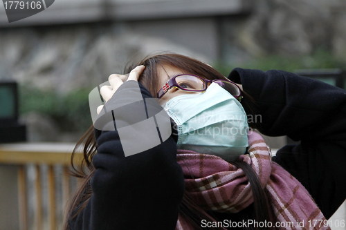 Image of Chinese sad girl with depression