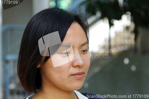 Image of Asian sad girl