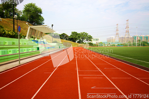 Image of Stadium chairs and running track