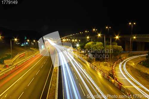 Image of Traffic through downtown of Hong Kong at night