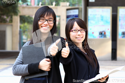 Image of Asian woman with thumb up