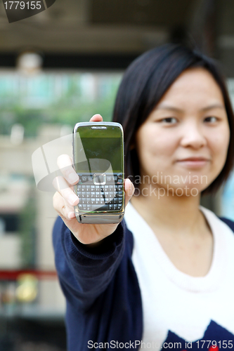 Image of Asian woman shows her mobile phone