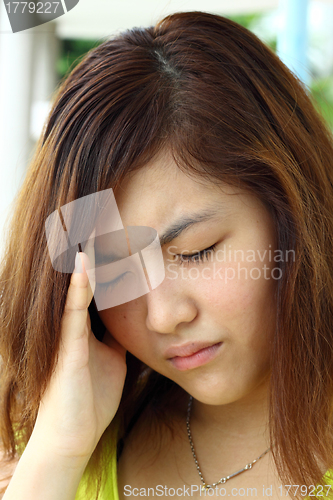 Image of Asian sick woman