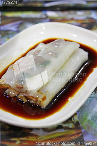 Image of Chinese rice roll with pork inside