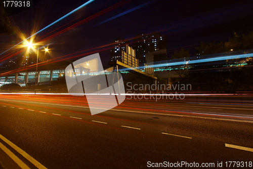 Image of Modern city with night traffic