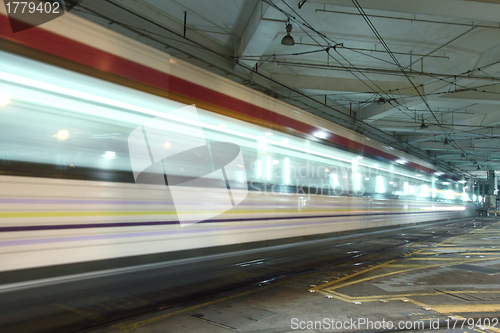 Image of Light rail in Hong Kong at night