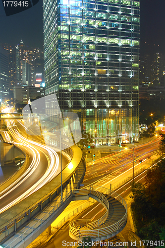 Image of Traffic in modern city at night