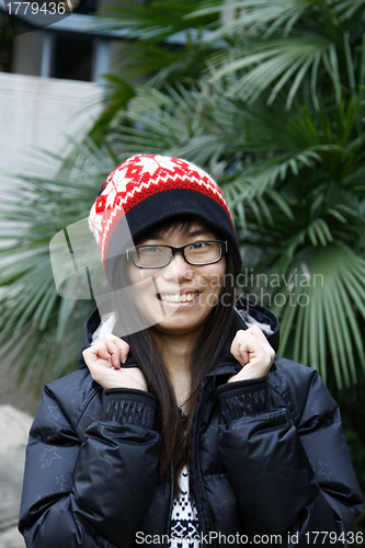 Image of Chinese girl smiling happily