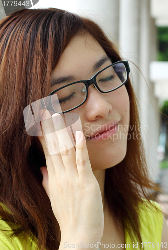 Image of Asian woman with glasses