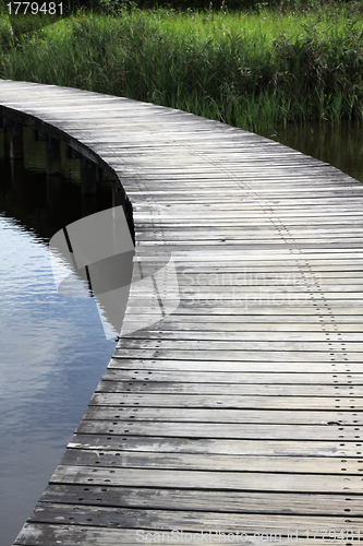 Image of A wooden path in wetland park