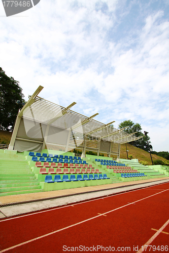 Image of Stadium chairs and running track