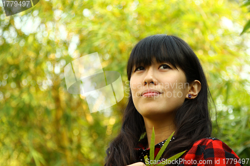 Image of Asian woman loves nature