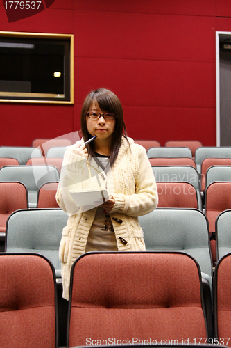 Image of Asian student in lecture hall