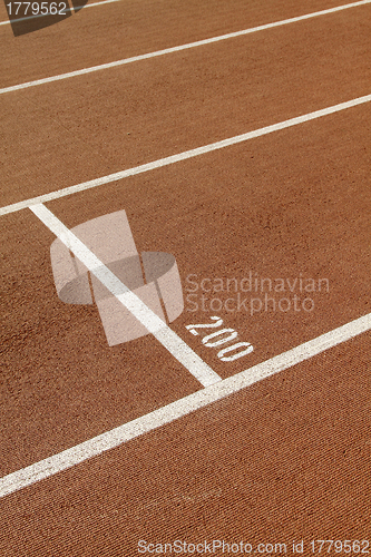 Image of Running track in a stadium with number 200