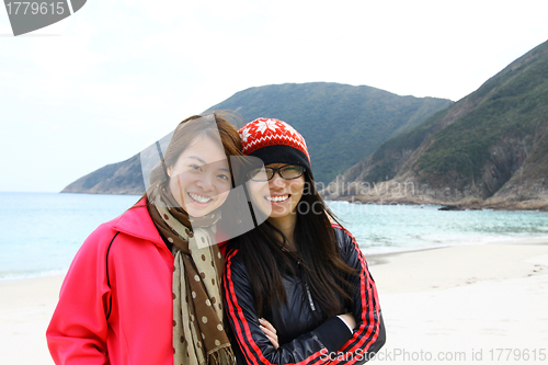 Image of Two happy asian friends