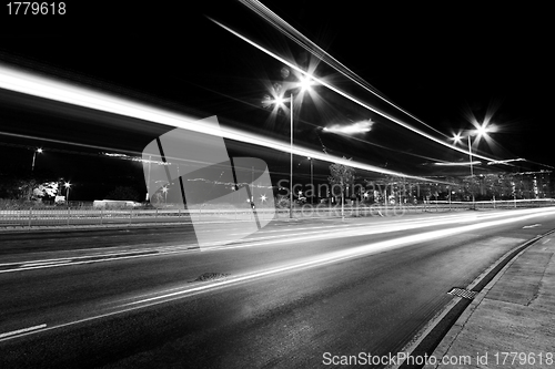 Image of Traffic in city in black and white toned