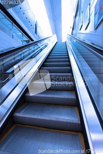 Image of Moving escalator to heaven concept