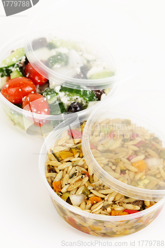 Image of Prepared salads in takeout containers