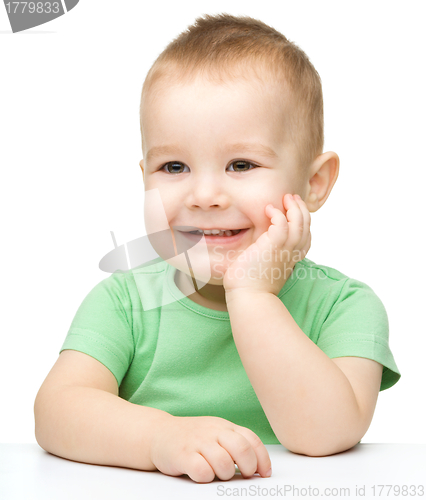 Image of Portrait of a cute and pensive little boy