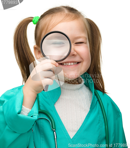 Image of Cute little girl is playing doctor