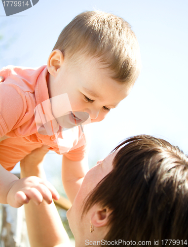 Image of Portrait of a happy mother with her son