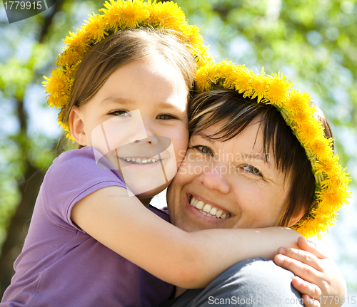Image of Portrait of happy daughter with her mother