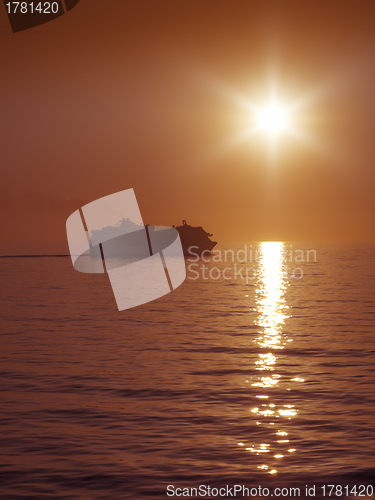 Image of sunset and cruise ship