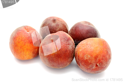 Image of five peaches