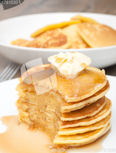 Image of Pancakes With Butter and Maple Syrup