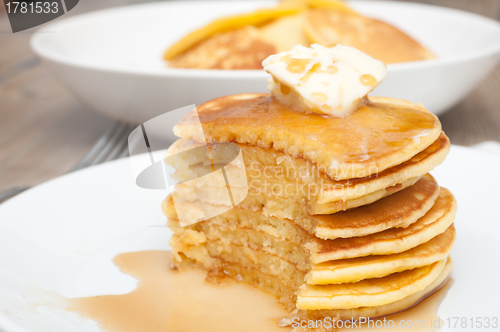 Image of Pancakes With Butter and Maple Syrup