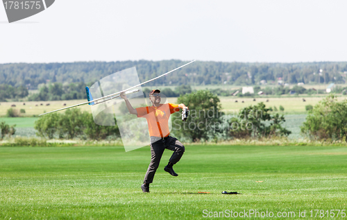 Image of Man launches into the sky RC glider