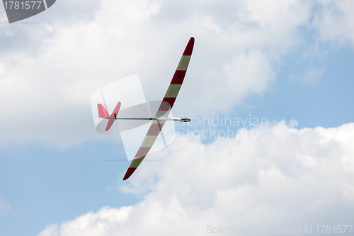 Image of RC glider flying in the blue sky