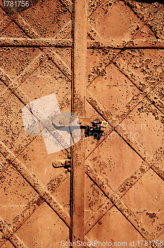 Image of vintage retro rusty steel door background 