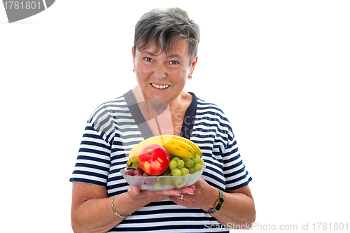Image of Senior woman with fruit