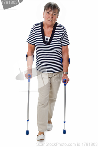 Image of Senior woman on crutches