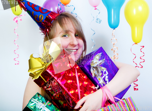 Image of Birthday. happy young girl with gifts