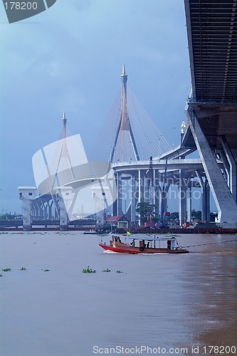 Image of Bridge and tug-boat in Bangkok, Thailand