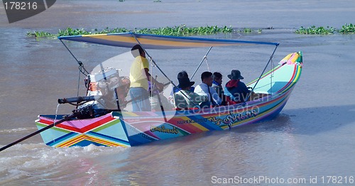 Image of Longtail boat with passengers