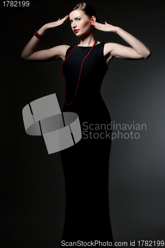 Image of young woman in black dress