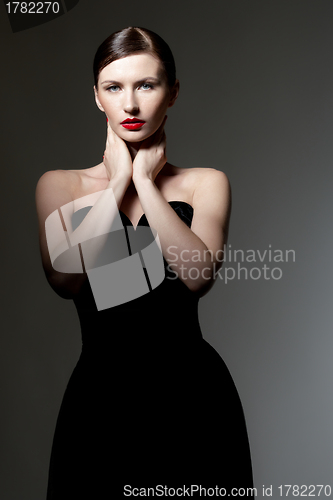 Image of young woman in black dress