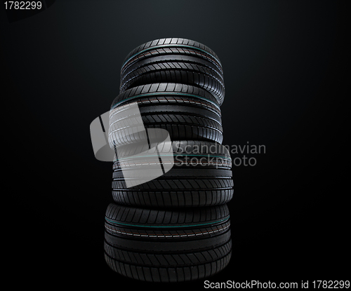 Image of new summer tires stacked