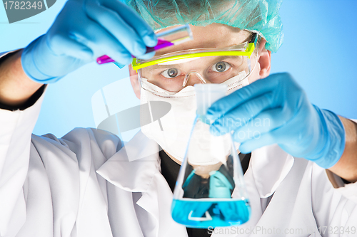 Image of chemist at work